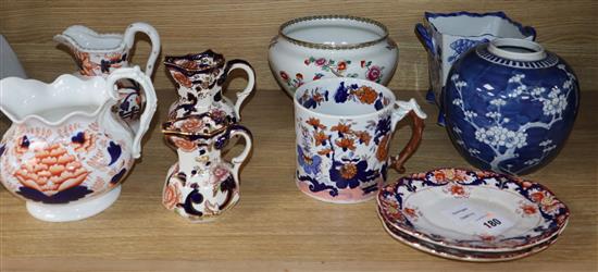 A collection of Victorian and later pottery two handled cider mugs, tankards, jugs and dishes